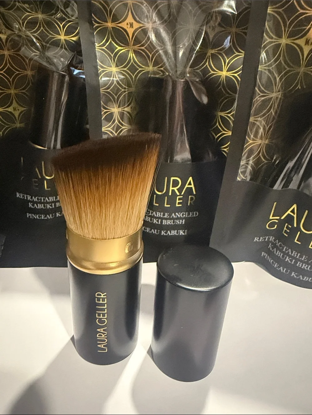 Laura Geller Black and Gold Retractable Angled Kabuki Brush brand new